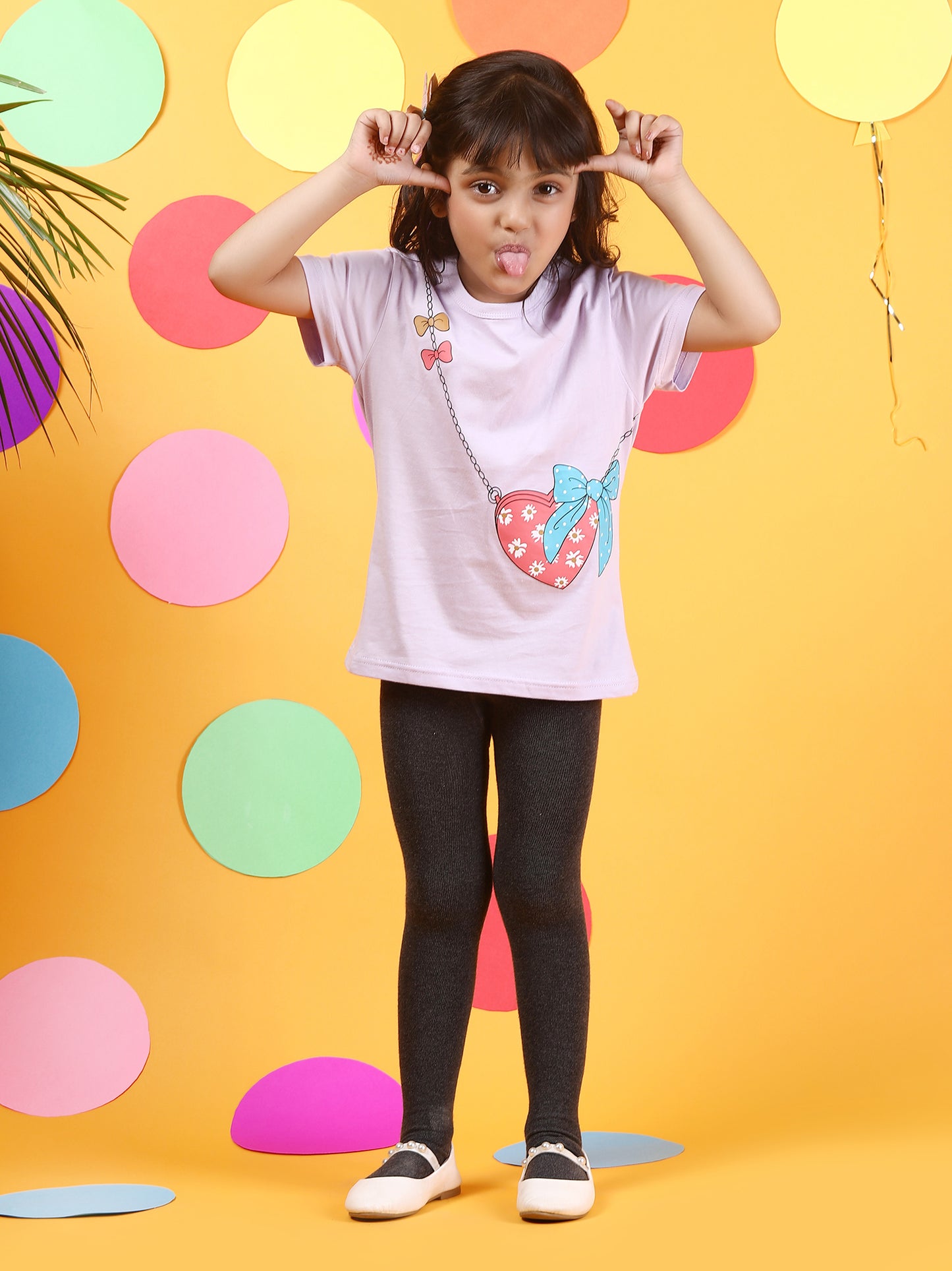 Purple Short Sleeve Girls' Summer T Shirt with a printed sling bag