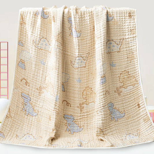 Baby blanket with dinosaur pattern on a white background