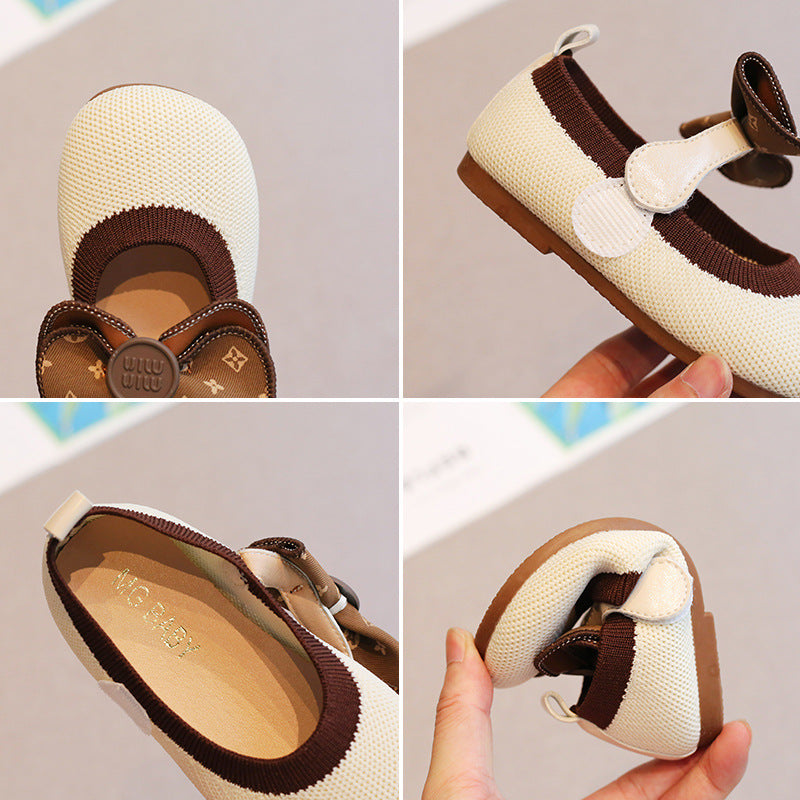 Collage of children's shoes with brown and white design, held by a hand.