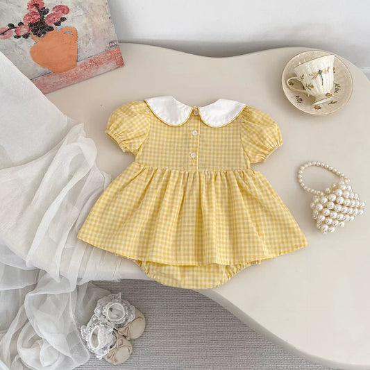 Yellow checkered dress with white collar and duck embroidery