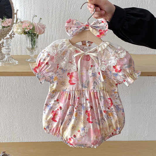 Floral baby romper with a headband by CrazyToes