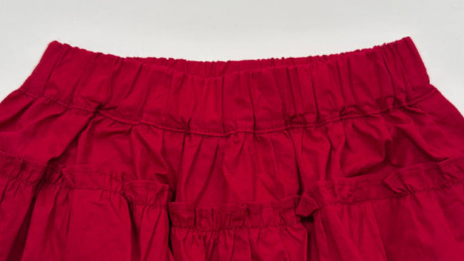 Red ruffled skirt on a white background