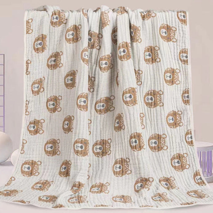 Baby blanket with bear pattern on a light background