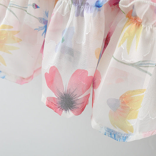 Floral patterned fabric with colorful flowers on a light background