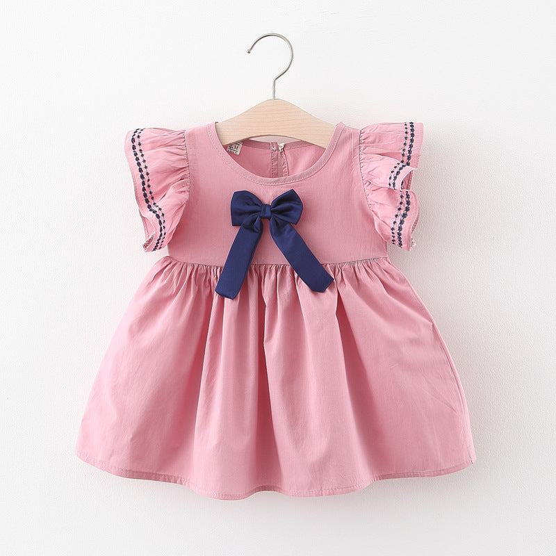 Pink dress with a blue bow on a white background