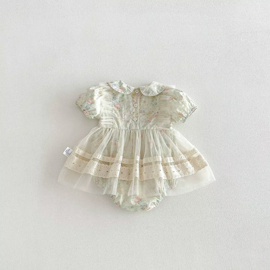 Baby romper with floral pattern on a white background